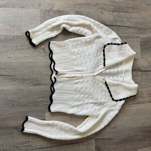 Elegant White Cardigan Sweater with Black Trim